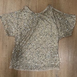 Ladies gold sequence top. Medium. New with tags.Never worn